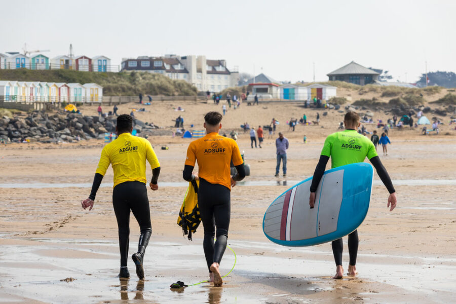 Adaptive surfers on the beach at Bude